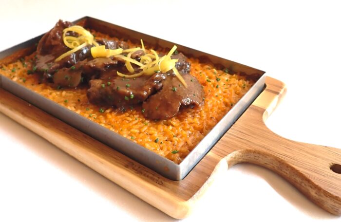 Saffron rice with beef cheeks roasted in red wine and candied lemon 
